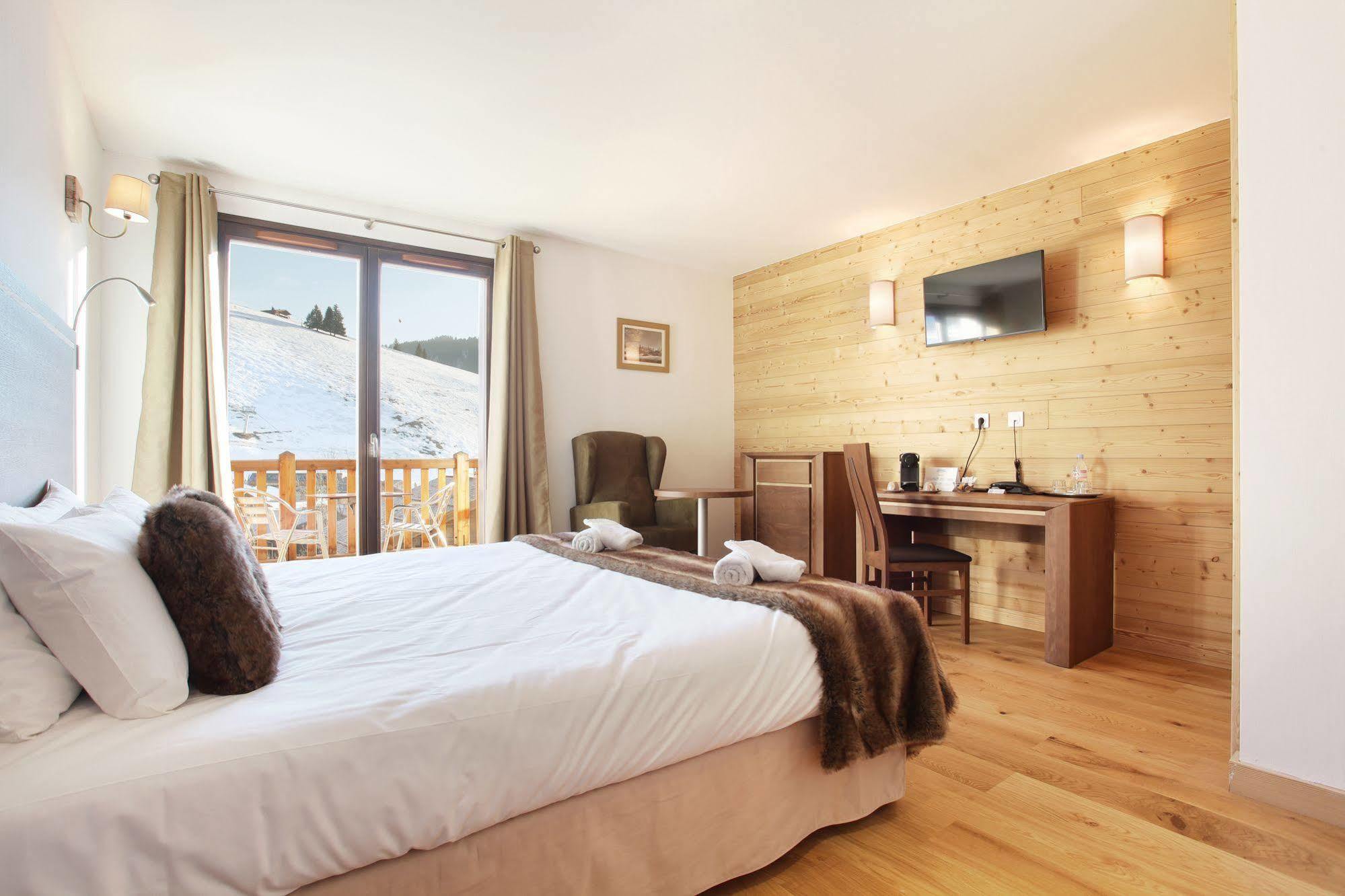 Hotel Prestige Odalys Le Chamois La Clusaz Exterior photo